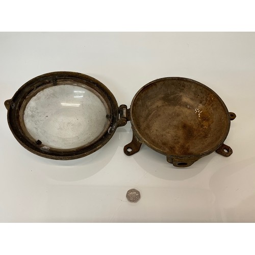 362 - Vintage Lighting, a cast bulkhead light with a keyed domed glass front 8 ½ inches in dia.

This lot ... 