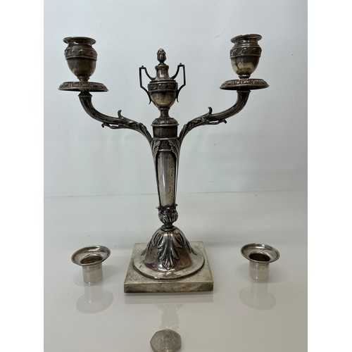 370 - Two branch candelabra of classical design, 11 inches high.

This lot is available for in-house shipp... 