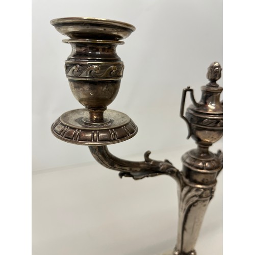 370 - Two branch candelabra of classical design, 11 inches high.

This lot is available for in-house shipp... 