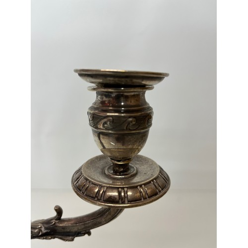 370 - Two branch candelabra of classical design, 11 inches high.

This lot is available for in-house shipp... 