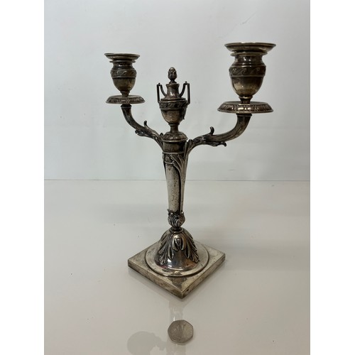 370 - Two branch candelabra of classical design, 11 inches high.

This lot is available for in-house shipp... 