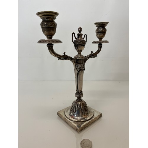 370 - Two branch candelabra of classical design, 11 inches high.

This lot is available for in-house shipp... 