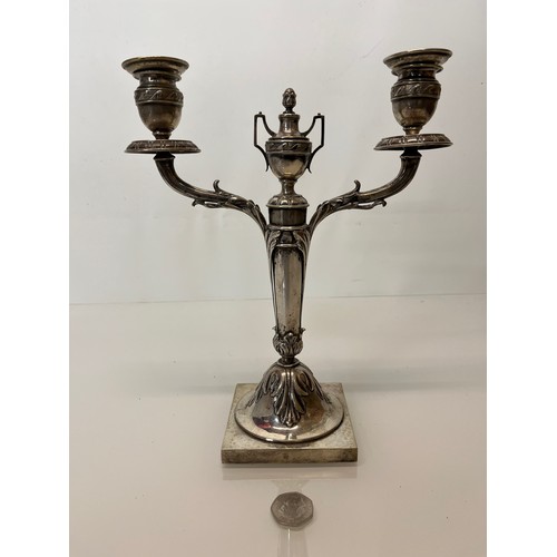 370 - Two branch candelabra of classical design, 11 inches high.

This lot is available for in-house shipp... 