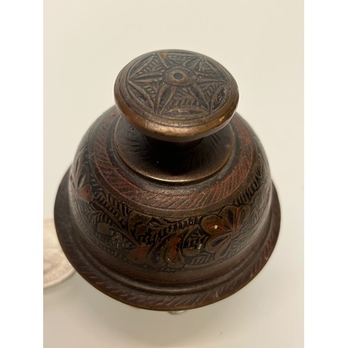 373 - Tibetan temple hand bell. Cast bronze with enamelled decoration. 

This lot is available for in-hous... 