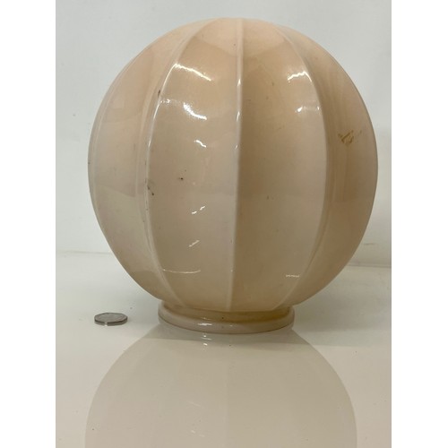 374 - Art deco pink glass lamp shade 10 inches in diameter.

This lot is available for in-house shipping