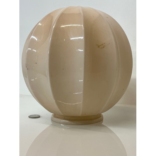 374 - Art deco pink glass lamp shade 10 inches in diameter.

This lot is available for in-house shipping