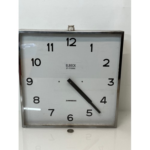 375 - Large industrial wall clock in a chrome plated frame, 16 inches square.

This lot is available for i... 