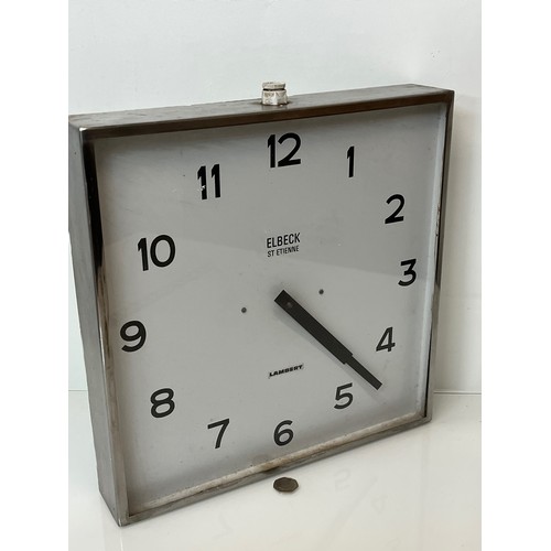 375 - Large industrial wall clock in a chrome plated frame, 16 inches square.

This lot is available for i... 