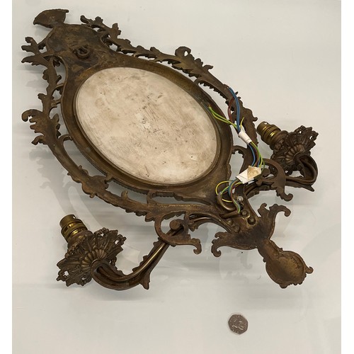 444 - Decorative lighting, large wall sconce cast in brass with decorated ceramic panel to the centre 69 c... 