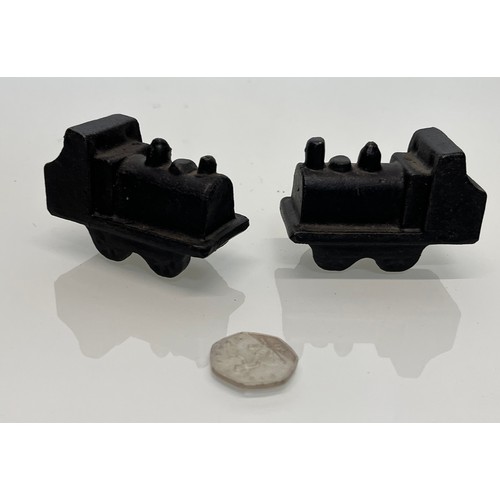 445 - A pair of cast iron model steam trains

This lot is available for in-house shipping