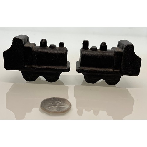 445 - A pair of cast iron model steam trains

This lot is available for in-house shipping