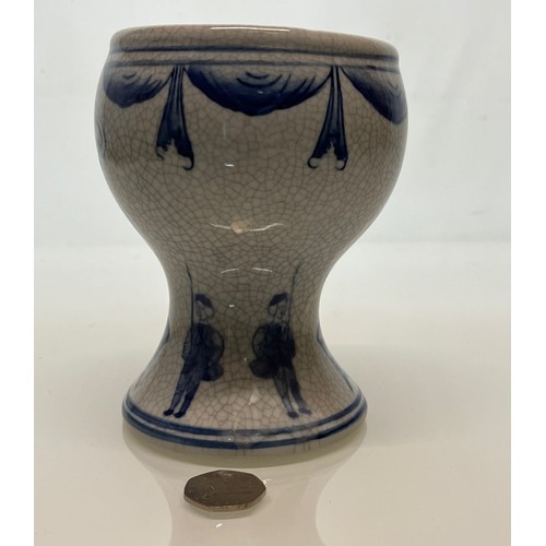 446 - A decorative crackle glazed vase with illustrations of fisherman around the base above these are a m... 