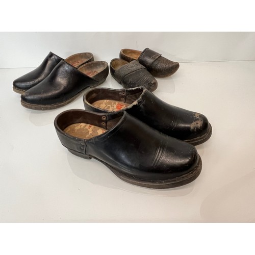 146 - A collection of early C20th working shoes, wooden soled clogs for all members of a family.

This lot... 