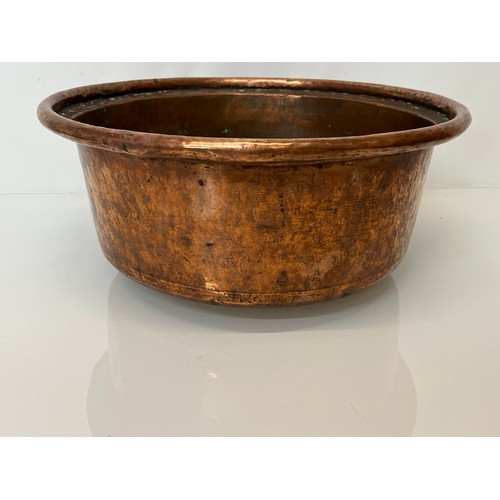 148 - Large early C20th hand worked copper bowl, 41 cm x  17 cm high.

This lot is collection only