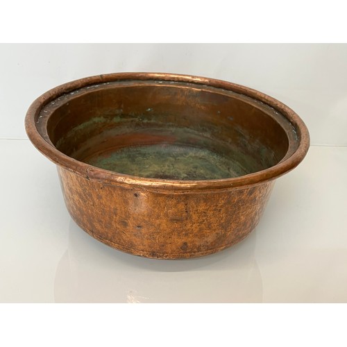 148 - Large early C20th hand worked copper bowl, 41 cm x  17 cm high.

This lot is collection only