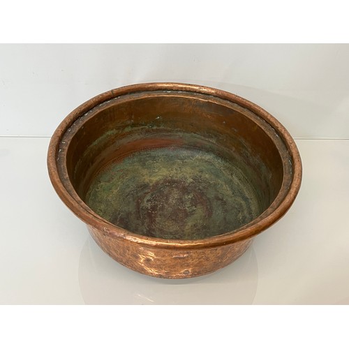 148 - Large early C20th hand worked copper bowl, 41 cm x  17 cm high.

This lot is collection only