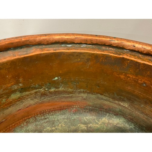 148 - Large early C20th hand worked copper bowl, 41 cm x  17 cm high.

This lot is collection only