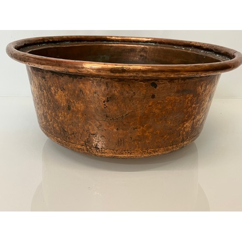 148 - Large early C20th hand worked copper bowl, 41 cm x  17 cm high.

This lot is collection only