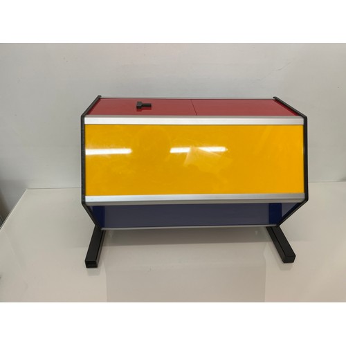 154 - A tombola machine, coloured Perspex with a sliding entry drawer.
48 cm wide  and 36 cm tall.

This l... 