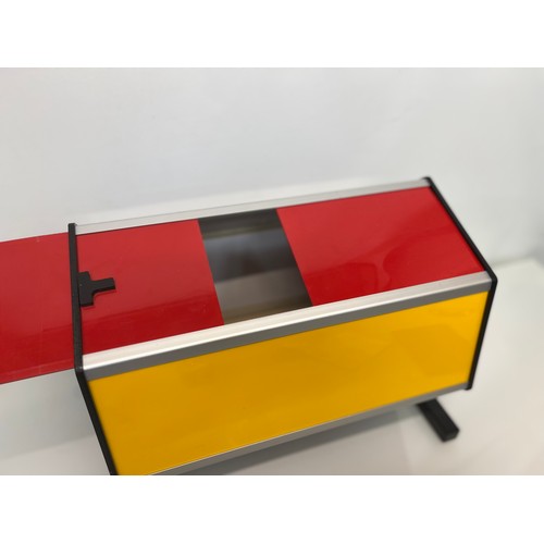 154 - A tombola machine, coloured Perspex with a sliding entry drawer.
48 cm wide  and 36 cm tall.

This l... 