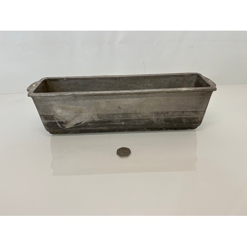 156 - Kitchenalia, a cast aluminium cooking vessel. 37 cm x 9 cm x 10 cm high.

This lot is available for ... 