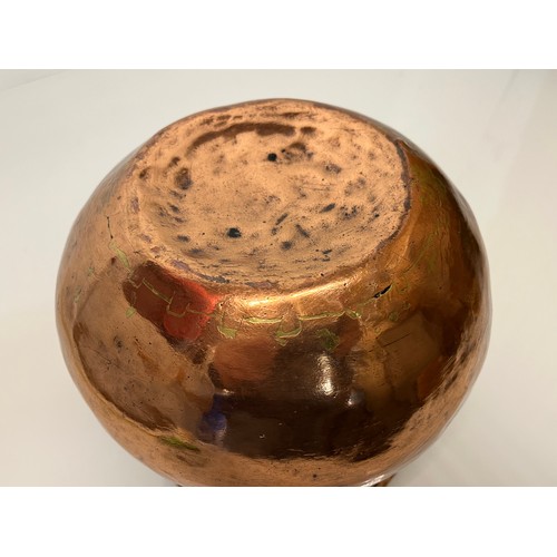 157 - Decorative hand made art nouveau copper two handled pot. 20 cm high

This lot is available for in-ho... 