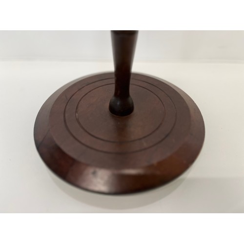 399 - Treen, a large turned mahogany darning mushroom 8 inches in diameter.

This lot is available for in-... 