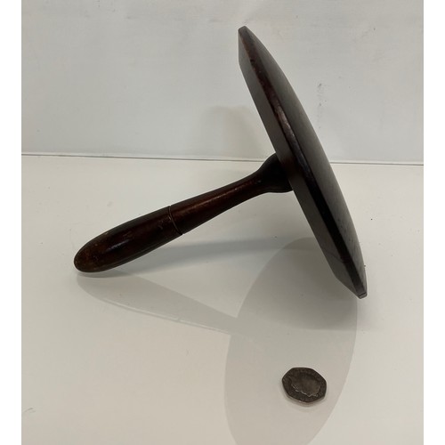 399 - Treen, a large turned mahogany darning mushroom 8 inches in diameter.

This lot is available for in-... 