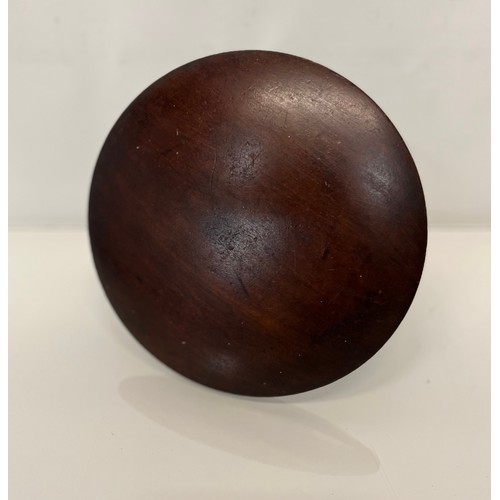 399 - Treen, a large turned mahogany darning mushroom 8 inches in diameter.

This lot is available for in-... 