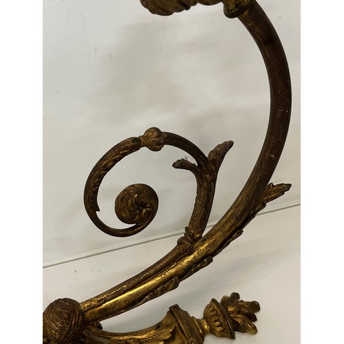 167 - Decorative lighting, a pair of gilded cast brass wall lights, with nicely detailed classical designs... 