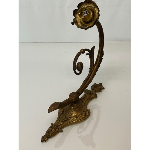 167 - Decorative lighting, a pair of gilded cast brass wall lights, with nicely detailed classical designs... 