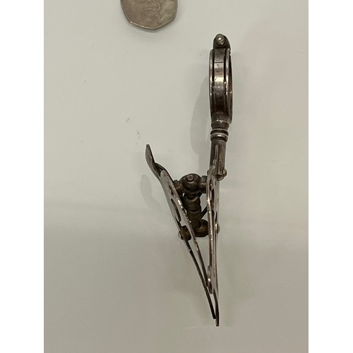 177 - Veteran Cycling equipment, an Edwardian era lady cyclists skirt clip.

This lot is available for in-... 