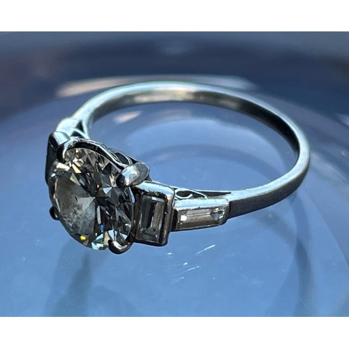 358 - Art Deco Solitaire Diamond ring, on a platinum mounting, the central stone is 8.75 mm diameter and h... 