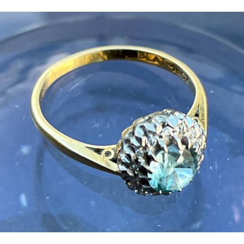 359 - Art Deco ring, a platinum mounted 5.5 mm blue faceted stone surrounded by Diamonds on an 18ct gold r... 