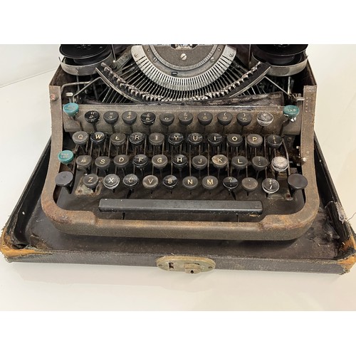 6 - Cased portable typewriter.

This lot is available for in-house shipping