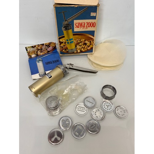 7 - Mid Century Danish cooking wares, a boxed Sawa 2000 cookie press and decorative icing etc.

This lot... 