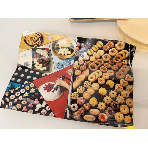 7 - Mid Century Danish cooking wares, a boxed Sawa 2000 cookie press and decorative icing etc.

This lot... 