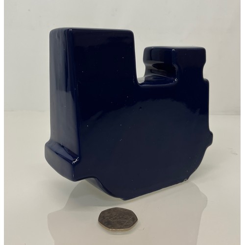 9 - Carlton ware studio pottery money box in the form of a train. 13 cm high x 15 cm long.

This lot is ... 