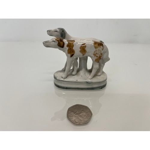 13 - Staffordshire dog figurine, nicely hand decorated and marked to the rear with 2386.

This lot is ava... 