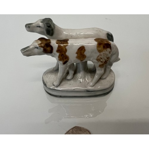 13 - Staffordshire dog figurine, nicely hand decorated and marked to the rear with 2386.

This lot is ava... 