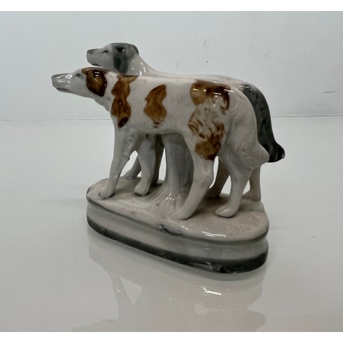 13 - Staffordshire dog figurine, nicely hand decorated and marked to the rear with 2386.

This lot is ava... 