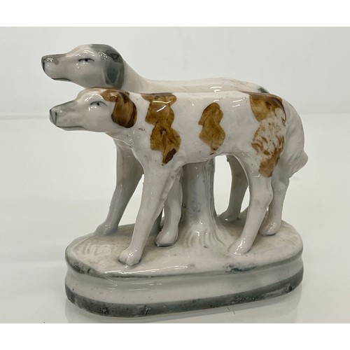 13 - Staffordshire dog figurine, nicely hand decorated and marked to the rear with 2386.

This lot is ava... 