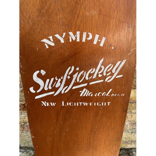 15 - 1960’s vintage wooden surf board, a Nymph Surf Jockey belly board, 120cm long.

This lot is availabl... 