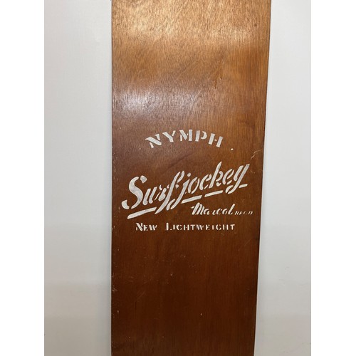 15 - 1960’s vintage wooden surf board, a Nymph Surf Jockey belly board, 120cm long.

This lot is availabl... 