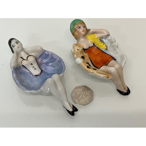 19 - Two kitsch Japanese pottery pin trays hand decorated with reclining female figures. 12 cm long.

Thi... 