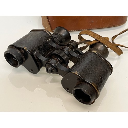 24 - Militaria, a pair of cased WWI German military binoculars, Oigee Oigtur X6 field glasses 

This lot ... 