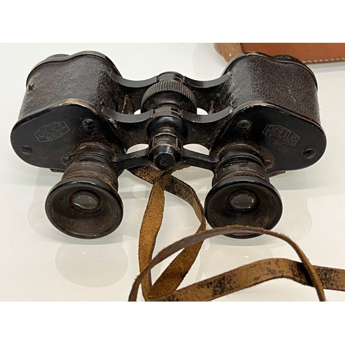 24 - Militaria, a pair of cased WWI German military binoculars, Oigee Oigtur X6 field glasses 

This lot ... 