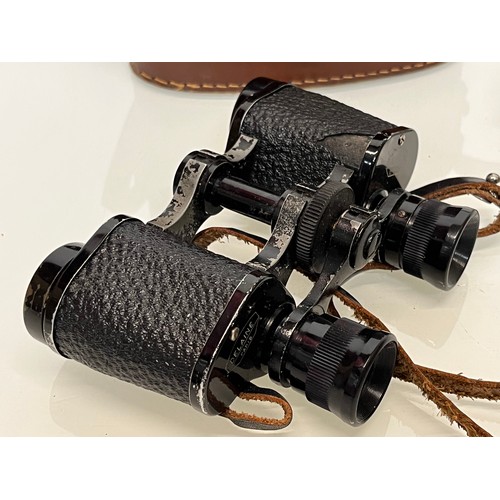 25 - Militaria, binoculars, a cased pair of Delaine Excella 8 X 26 field glasses

This lot is available f... 