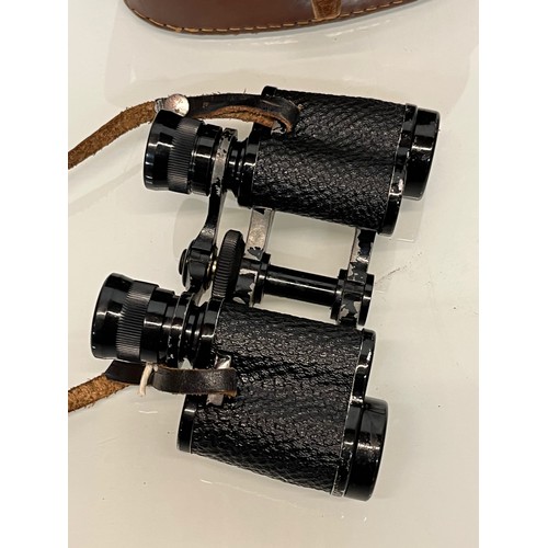 25 - Militaria, binoculars, a cased pair of Delaine Excella 8 X 26 field glasses

This lot is available f... 