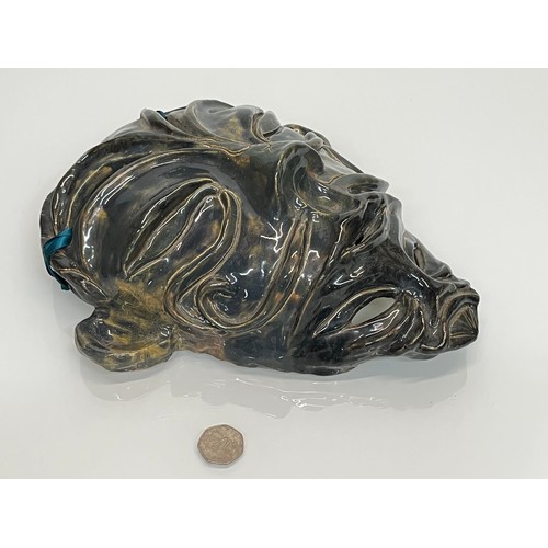 33 - Studio pottery wall mask, 30 cm tall.

This lot is available for in-house shipping